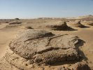 The so-called yadrangs, eroded clay cones, remains of original clay bottoms of dessicated lakes. At the banks of these lakes, the first hunters settled down and made their livelihood at least partially by agriculture.